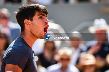 2024-06-09 - Carlos ALCARAZ of Spain celebrates his point during the fifteenth day of Roland-Garros 2024, ATP and WTA Grand Slam tennis tournament on June 09, 2024 at Roland-Garros stadium in Paris, France - TENNIS - ROLAND GARROS 2024 - 09/06 - INTERNATIONALS - TENNIS