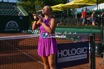 2024-07-21 - Happiness of Diana Shnaider after win the final match vs. Aliaksandra Sasnovich at the WTA250 Hungarian Gran Prix Tennis on 19th July 2024 at Romai Teniszakademia, Budapest, Hungary - WTA HUNGARIAN GRAND PRIX - FINAL - INTERNATIONALS - TENNIS