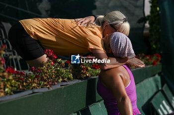 2024-07-21 - Diana Shnaider hugs her mum after win the final match vs. Aliaksandra Sasnovich at the WTA250 Hungarian Gran Prix Tennis on 19th July 2024 at Romai Teniszakademia, Budapest, Hungary - WTA HUNGARIAN GRAND PRIX - FINAL - INTERNATIONALS - TENNIS