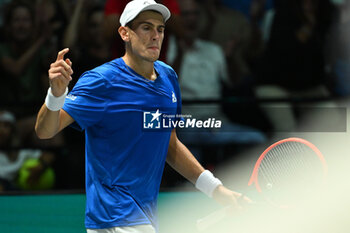 2024-09-11 - Matteo Arnaldi (ITA) in action during the 2024 Davis Cup Finals Group Stage Bologna match between the Italy and Brazil at Unipol Arena on September 11, 2024 in Bologna, Italy. - DAVIS CUP - INTERNATIONALS - TENNIS