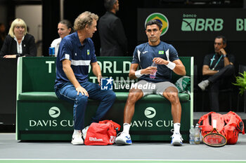 2024-09-11 - Thiago Monteiro (BRA) in action during the 2024 Davis Cup Finals Group Stage Bologna match between the Italy and Brazil at Unipol Arena on September 11, 2024 in Bologna, Italy. - DAVIS CUP - INTERNATIONALS - TENNIS