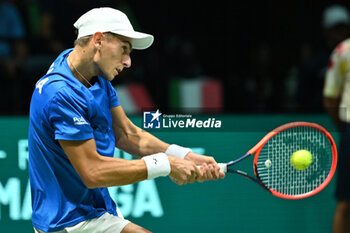 2024-09-11 - Matteo Arnaldi (ITA) in action during the 2024 Davis Cup Finals Group Stage Bologna match between the Italy and Brazil at Unipol Arena on September 11, 2024 in Bologna, Italy. - DAVIS CUP - INTERNATIONALS - TENNIS