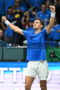 2024-09-11 - Matteo Arnaldi (ITA) in action during the 2024 Davis Cup Finals Group Stage Bologna match between the Italy and Brazil at Unipol Arena on September 11, 2024 in Bologna, Italy. - DAVIS CUP - INTERNATIONALS - TENNIS