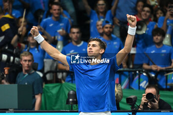 2024-09-11 - Matteo Arnaldi (ITA) in action during the 2024 Davis Cup Finals Group Stage Bologna match between the Italy and Brazil at Unipol Arena on September 11, 2024 in Bologna, Italy. - DAVIS CUP - INTERNATIONALS - TENNIS