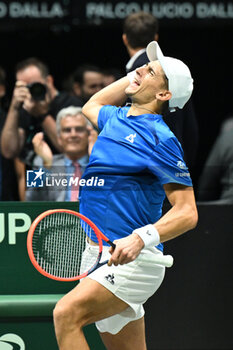 2024-09-11 - Matteo Arnaldi (ITA) in action during the 2024 Davis Cup Finals Group Stage Bologna match between the Italy and Brazil at Unipol Arena on September 11, 2024 in Bologna, Italy. - DAVIS CUP - INTERNATIONALS - TENNIS