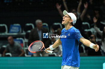 2024-09-11 - Matteo Arnaldi (ITA) in action during the 2024 Davis Cup Finals Group Stage Bologna match between the Italy and Brazil at Unipol Arena on September 11, 2024 in Bologna, Italy. - DAVIS CUP - INTERNATIONALS - TENNIS