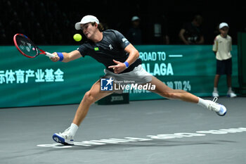 2024-09-12 - Joao Fonseca (BRA) in action during the 2024 Davis Cup Finals Group Stage Bologna match between the Netherlands and Brazil at Unipol Arena on September 12, 2024 in Bologna, Italy. - DAVIS CUP - INTERNATIONALS - TENNIS