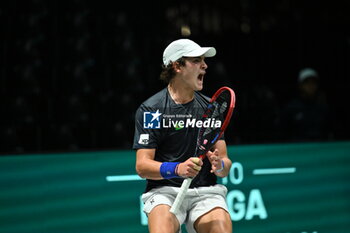 2024-09-12 - Joao Fonseca (BRA) in action during the 2024 Davis Cup Finals Group Stage Bologna match between the Netherlands and Brazil at Unipol Arena on September 12, 2024 in Bologna, Italy. - DAVIS CUP - INTERNATIONALS - TENNIS