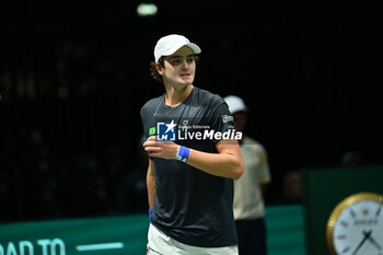 2024-09-12 - Joao Fonseca (BRA) in action during the 2024 Davis Cup Finals Group Stage Bologna match between the Netherlands and Brazil at Unipol Arena on September 12, 2024 in Bologna, Italy. - DAVIS CUP - INTERNATIONALS - TENNIS