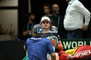 2024-09-12 - Joao Fonseca (BRA) in action during the 2024 Davis Cup Finals Group Stage Bologna match between the Netherlands and Brazil at Unipol Arena on September 12, 2024 in Bologna, Italy. - DAVIS CUP - INTERNATIONALS - TENNIS