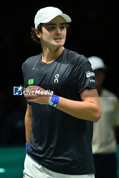 2024-09-12 - Joao Fonseca (BRA) in action during the 2024 Davis Cup Finals Group Stage Bologna match between the Netherlands and Brazil at Unipol Arena on September 12, 2024 in Bologna, Italy. - DAVIS CUP - INTERNATIONALS - TENNIS