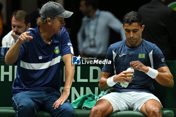 2024-09-12 - Brazil Captain Jaime Oncins (BRA) and Thiago Monteiro (BRA) during the 2024 Davis Cup Finals Group Stage Bologna match between the Netherlands and Brazil at Unipol Arena on September 12, 2024 in Bologna, Italy. - DAVIS CUP - INTERNATIONALS - TENNIS