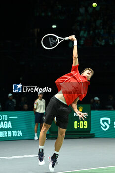 2024-09-13 - Alexander Blockx (BEL) in action during the 2024 Davis Cup Finals Group Stage Bologna match between the Italy and Belgium at Unipol Arena on September 13, 2024 in Bologna, Italy. - DAVIS CUP - INTERNATIONALS - TENNIS