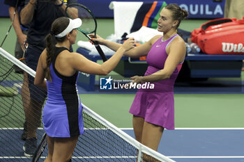 2024-09-08 - Aryna Sabalenka of Belarus (R) hugs Jessica Pegula of USA after winning the women's final during day 13 of the 2024 US Open, Grand Slam tennis tournament on 7 September 2024 at USTA Billie Jean King National Tennis Center in New York, United States - TENNIS - US OPEN 2024 - 07/09 - INTERNATIONALS - TENNIS