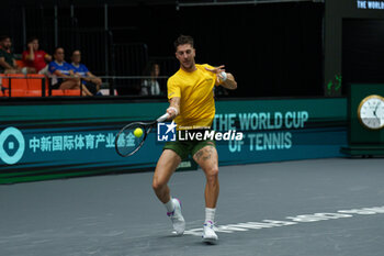 2024-09-10 - Thanasi Kokkinakis of Australia in action against Arthur Fils of France during the Davis Cup 2024, Group B, tennis match played between France and Australia at Fuente de San Luis on September 10, 2024, in Valencia, Spain. Photo Alvaro Diaz / SpainDPPI / DPPI - TENNIS - DAVIS CUP - FRANCE V AUSTRALIA - INTERNATIONALS - TENNIS