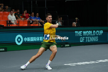 2024-09-10 - Thanasi Kokkinakis of Australia in action against Arthur Fils of France during the Davis Cup 2024, Group B, tennis match played between France and Australia at Fuente de San Luis on September 10, 2024, in Valencia, Spain. Photo Alvaro Diaz / SpainDPPI / DPPI - TENNIS - DAVIS CUP - FRANCE V AUSTRALIA - INTERNATIONALS - TENNIS