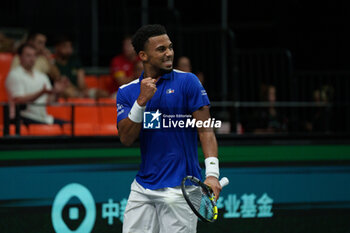 2024-09-10 - Arthur Fils of France in action against Thanasi Kokkinakis of Australia during the Davis Cup 2024, Group B, tennis match played between France and Australia at Fuente de San Luis on September 10, 2024, in Valencia, Spain. Photo Alvaro Diaz / SpainDPPI / DPPI - TENNIS - DAVIS CUP - FRANCE V AUSTRALIA - INTERNATIONALS - TENNIS