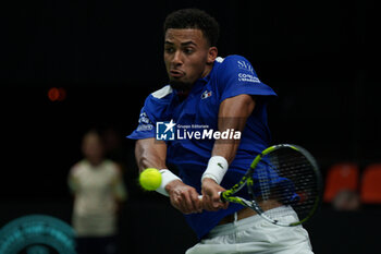 2024-09-10 - Arthur Fils of France in action against Thanasi Kokkinakis of Australia during the Davis Cup 2024, Group B, tennis match played between France and Australia at Fuente de San Luis on September 10, 2024, in Valencia, Spain. Photo Alvaro Diaz / SpainDPPI / DPPI - TENNIS - DAVIS CUP - FRANCE V AUSTRALIA - INTERNATIONALS - TENNIS