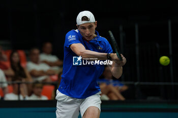 2024-09-10 - Ugo Humbert of France in action against Alexei Popyrin of Australia during the Davis Cup 2024, Group B, tennis match played between France and Australia at Fuente de San Luis on September 10, 2024, in Valencia, Spain. Photo Alvaro Diaz / SpainDPPI / DPPI - TENNIS - DAVIS CUP - FRANCE V AUSTRALIA - INTERNATIONALS - TENNIS