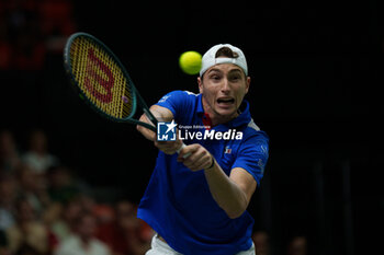 2024-09-10 - Ugo Humbert of France in action against Alexei Popyrin of Australia during the Davis Cup 2024, Group B, tennis match played between France and Australia at Fuente de San Luis on September 10, 2024, in Valencia, Spain. Photo Alvaro Diaz / SpainDPPI / DPPI - TENNIS - DAVIS CUP - FRANCE V AUSTRALIA - INTERNATIONALS - TENNIS