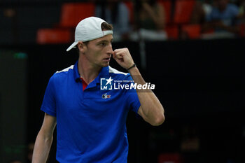 2024-09-10 - Ugo Humbert of France in action against Alexei Popyrin of Australia during the Davis Cup 2024, Group B, tennis match played between France and Australia at Fuente de San Luis on September 10, 2024, in Valencia, Spain. Photo Alvaro Diaz / SpainDPPI / DPPI - TENNIS - DAVIS CUP - FRANCE V AUSTRALIA - INTERNATIONALS - TENNIS