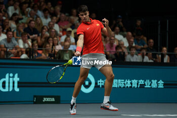 2024-09-11 - Carlos Alcaraz of Spain in action against Tomas Machac of Czech Republic during the Davis Cup 2024, Group B, tennis match played between Czech Republic and Spain at Fuente de San Luis on September 11, 2024, in Valencia, Spain. - CZECH REPUBLIC V SPAIN - DAVIS CUP 2024 GROUP B - INTERNATIONALS - TENNIS