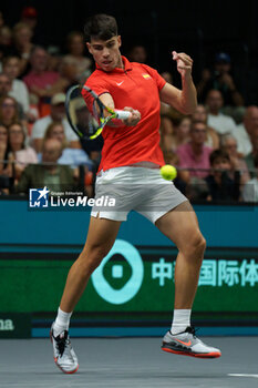 2024-09-11 - Carlos Alcaraz of Spain in action against Tomas Machac of Czech Republic during the Davis Cup 2024, Group B, tennis match played between Czech Republic and Spain at Fuente de San Luis on September 11, 2024, in Valencia, Spain. - CZECH REPUBLIC V SPAIN - DAVIS CUP 2024 GROUP B - INTERNATIONALS - TENNIS