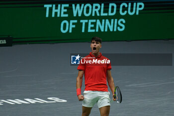 2024-09-11 - Carlos Alcaraz of Spain reacts against Tomas Machac of Czech Republic during the Davis Cup 2024, Group B, tennis match played between Czech Republic and Spain at Fuente de San Luis on September 11, 2024, in Valencia, Spain. - CZECH REPUBLIC V SPAIN - DAVIS CUP 2024 GROUP B - INTERNATIONALS - TENNIS