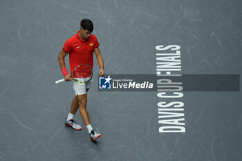 2024-09-11 - Carlos Alcaraz of Spain in action against Tomas Machac of Czech Republic during the Davis Cup 2024, Group B, tennis match played between Czech Republic and Spain at Fuente de San Luis on September 11, 2024, in Valencia, Spain. - CZECH REPUBLIC V SPAIN - DAVIS CUP 2024 GROUP B - INTERNATIONALS - TENNIS