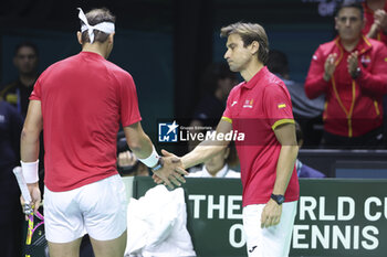 2024-11-19 - Rafael Nadal of Spain and Davis Cup Captain David Ferrer during the 2024 Davis Cup Finals quarter-final tennis tie between Netherlands and Spain at Palacio de Deportes Jose Maria Martin Carpena on 19 November 2024 in Malaga, Spain - TENNIS - DAVIS CUP 2024 - 1/4 - NETHERLANDS V SPAIN - INTERNATIONALS - TENNIS