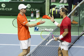 2024-11-19 - Botic Van De Zandschulp of Netherlands shakes hands with Rafael Nadal of Spain after his victory during the 2024 Davis Cup Finals quarter-final tennis tie between Netherlands and Spain at Palacio de Deportes Jose Maria Martin Carpena on 19 November 2024 in Malaga, Spain - TENNIS - DAVIS CUP 2024 - 1/4 - NETHERLANDS V SPAIN - INTERNATIONALS - TENNIS