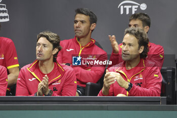 2024-11-19 - Juan Carlos Ferrero, coach of Carlos Alcaraz of Spain, Carlos Moya, coach of Rafael Nadal of Spain during the 2024 Davis Cup Finals quarter-final tennis tie between Netherlands and Spain at Palacio de Deportes Jose Maria Martin Carpena on 19 November 2024 in Malaga, Spain - TENNIS - DAVIS CUP 2024 - 1/4 - NETHERLANDS V SPAIN - INTERNATIONALS - TENNIS