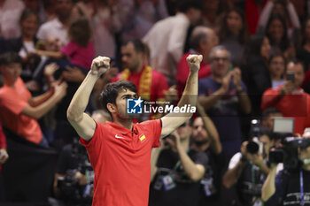 2024-11-19 - Carlos Alcaraz of Spain celebrates his victory against Tallon Griekspoor of Netherlands during the 2024 Davis Cup Finals quarter-final tennis tie between Netherlands and Spain at Palacio de Deportes Jose Maria Martin Carpena on 19 November 2024 in Malaga, Spain - TENNIS - DAVIS CUP 2024 - 1/4 - NETHERLANDS V SPAIN - INTERNATIONALS - TENNIS