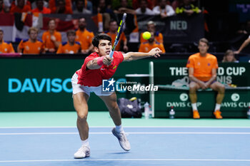 2024-11-19 - Carlos Alcaraz of Spain plays doubles during the Davis Cup 2024, quarter-final tennis event between Netherlands and Spain on 19 November 2024 in Malaga, Spain - TENNIS - DAVIS CUP 2024 - 1/4 - NETHERLANDS V SPAIN - INTERNATIONALS - TENNIS