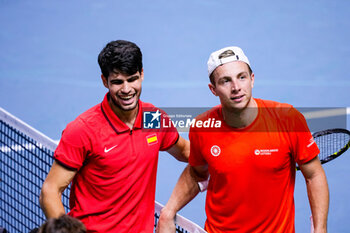 2024-11-19 - Carlos Alcaraz of Spain and Tallon Griekspoor of Netherlands during the Davis Cup 2024, quarter-final tennis event between Netherlands and Spain on 19 November 2024 in Malaga, Spain - TENNIS - DAVIS CUP 2024 - 1/4 - NETHERLANDS V SPAIN - INTERNATIONALS - TENNIS