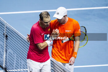 2024-11-19 - Rafael Nadal (R) of Spain greets Botic Van de Zandschulp of The Netherlands during the Davis Cup 2024, quarter-final tennis event between Netherlands and Spain on 19 November 2024 in Malaga, Spain - TENNIS - DAVIS CUP 2024 - 1/4 - NETHERLANDS V SPAIN - INTERNATIONALS - TENNIS