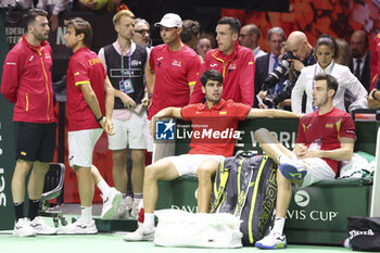 2024-11-20 - Team Spain with Pedro Martinez, David Ferrer, Rafael Nadal, Roberto Bautista Agut, Carlos Alcaraz, Marcel Granollers after losing the 2024 Davis Cup Finals quarter-final tennis tie between Netherlands and Spain at Palacio de Deportes Jose Maria Martin Carpena on 19 November 2024 in Malaga, Spain - TENNIS - DAVIS CUP 2024 - 1/4 - NETHERLANDS V SPAIN - INTERNATIONALS - TENNIS