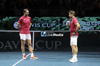 2024-11-20 - Rafael Nadal of Spain - here with Davis Cup Captain David Ferrer - during his farewell ceremony following the 2024 Davis Cup Finals quarter-final tennis tie between Netherlands and Spain at Palacio de Deportes Jose Maria Martin Carpena on 19 November 2024 in Malaga, Spain - TENNIS - DAVIS CUP 2024 - 1/4 - NETHERLANDS V SPAIN - INTERNATIONALS - TENNIS