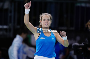 2024-11-20 - Lucia Bronzetti of Italy celebrates the victory against Viktoria Hruncakova of Slovakia, Final tennis match between Slovakia and Italy during the Billie Jean King Cup 2024 on 20 November 2024 in Malaga, Spain - TENNIS - BILLIE JEAN KING CUP 2024 - FINAL - INTERNATIONALS - TENNIS