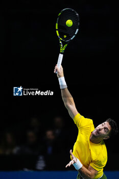 2024-11-21 - Thanasi Kokkinakis of Australia in action against Ben Shelton of USA during the Davis Cup 2024, quarter-final tennis event between United States and Australia on 21 November 2024 in Malaga, Spain - TENNIS - DAVIS CUP 2024 - 1/4 - USA V AUSTRALIA - INTERNATIONALS - TENNIS