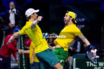 2024-11-21 - Matthew Ebden and Jordan Thompson of Australia celebrate after winning against Ben Shelton and Tommy Paul of USA during the Davis Cup 2024, quarter-final tennis event between United States and Australia on 21 November 2024 in Malaga, Spain - TENNIS - DAVIS CUP 2024 - 1/4 - USA V AUSTRALIA - INTERNATIONALS - TENNIS