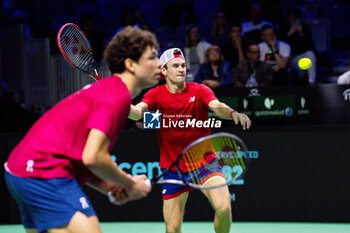 2024-11-21 - Tommy Paul of USA in action against Matthew Ebden and Jordan Thompson of Australia during the Davis Cup 2024, quarter-final tennis event between United States and Australia on 21 November 2024 in Malaga, Spain - TENNIS - DAVIS CUP 2024 - 1/4 - USA V AUSTRALIA - INTERNATIONALS - TENNIS