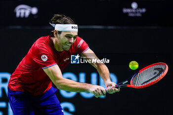 2024-11-21 - Taylor Fritz of USA in action against Alex de Minaur of Australia during the Davis Cup 2024, quarter-final tennis event between United States and Australia on 21 November 2024 in Malaga, Spain - TENNIS - DAVIS CUP 2024 - 1/4 - USA V AUSTRALIA - INTERNATIONALS - TENNIS