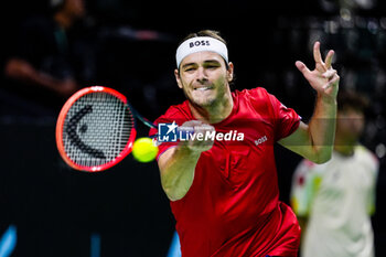 2024-11-21 - Taylor Fritz of USA in action against Alex de Minaur of Australia during the Davis Cup 2024, quarter-final tennis event between United States and Australia on 21 November 2024 in Malaga, Spain - TENNIS - DAVIS CUP 2024 - 1/4 - USA V AUSTRALIA - INTERNATIONALS - TENNIS