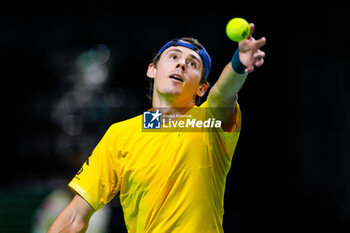 2024-11-21 - Alex de Minaur of Australia in action against Taylor Fritz of USA during the Davis Cup 2024, quarter-final tennis event between United States and Australia on 21 November 2024 in Malaga, Spain - TENNIS - DAVIS CUP 2024 - 1/4 - USA V AUSTRALIA - INTERNATIONALS - TENNIS