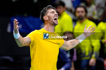 2024-11-21 - Thanasi Kokkinakis of Australia celebrates after winning against Ben Shelton of USA during the Davis Cup 2024, quarter-final tennis event between United States and Australia on 21 November 2024 in Malaga, Spain - TENNIS - DAVIS CUP 2024 - 1/4 - USA V AUSTRALIA - INTERNATIONALS - TENNIS