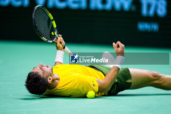 2024-11-21 - Thanasi Kokkinakis of Australia celebrates after winning against Ben Shelton of USA during the Davis Cup 2024, quarter-final tennis event between United States and Australia on 21 November 2024 in Malaga, Spain - TENNIS - DAVIS CUP 2024 - 1/4 - USA V AUSTRALIA - INTERNATIONALS - TENNIS