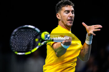 2024-11-21 - Thanasi Kokkinakis of Australia in action against Ben Shelton of USA during the Davis Cup 2024, quarter-final tennis event between United States and Australia on 21 November 2024 in Malaga, Spain - TENNIS - DAVIS CUP 2024 - 1/4 - USA V AUSTRALIA - INTERNATIONALS - TENNIS