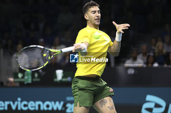 2024-11-21 - Thanasi Kokkinakis of Australia against Ben Shelton of USA during the 2024 Davis Cup Finals quarter-final tennis tie between United States (USA) and Australia at Palacio de Deportes Jose Maria Martin Carpena on November 21, 2024 in Malaga, Spain - TENNIS - DAVIS CUP 2024 - 1/4 - USA V AUSTRALIA - INTERNATIONALS - TENNIS