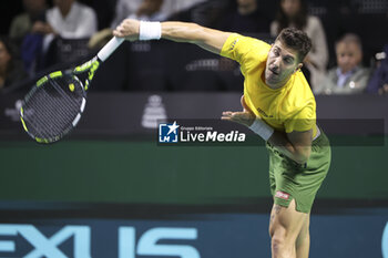 2024-11-21 - Thanasi Kokkinakis of Australia against Ben Shelton of USA during the 2024 Davis Cup Finals quarter-final tennis tie between United States (USA) and Australia at Palacio de Deportes Jose Maria Martin Carpena on November 21, 2024 in Malaga, Spain - TENNIS - DAVIS CUP 2024 - 1/4 - USA V AUSTRALIA - INTERNATIONALS - TENNIS